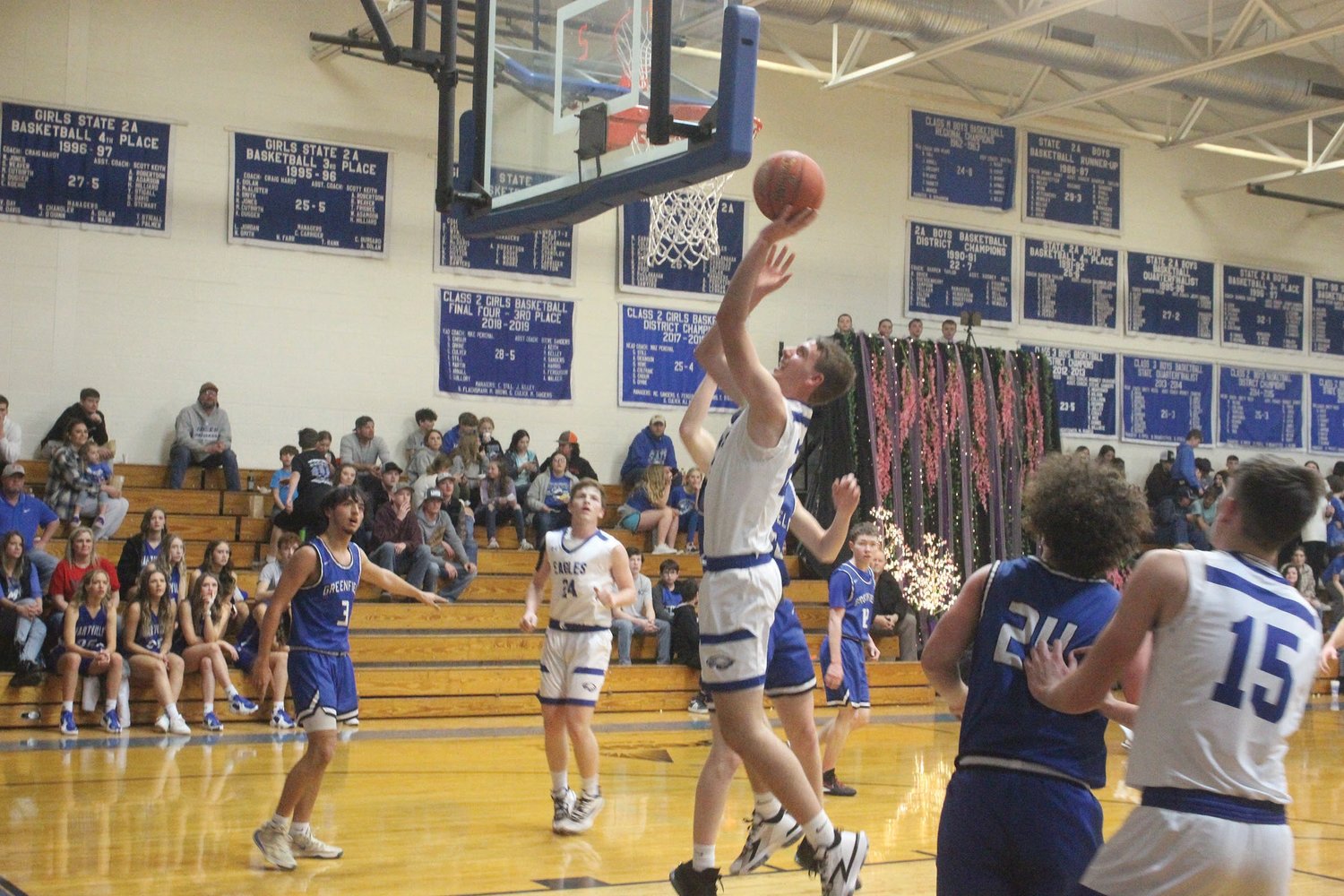 Hartville’s Brody McNiel makes his way to the basket for a layup against Greenfield.